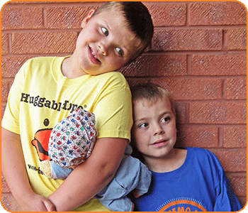 Zack, pictured left, with his younger brother Toby.